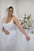 C2023-SN654 - robe de mariée sans manches à encolure dégagée et perles avec voile