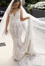 C2024-SK23 - fitted sleeveless wedding gown with v-bust line and beaded embroidery embellishments