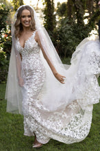 C2024-SK23 - fitted sleeveless wedding gown with v-bust line and beaded embroidery embellishments