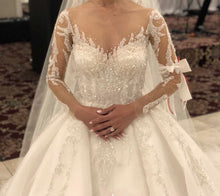 C2024-NAL440 - Illusion neckline beaded wedding ball gown with sheer long sleeves