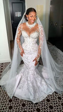 C2024-LSC78 - Swarovski Crystal beaded wedding gown with sheer long sleeves and illusion neckline collar