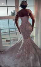 C2024-LSC78 - Swarovski Crystal beaded wedding gown with sheer long sleeves and illusion neckline collar