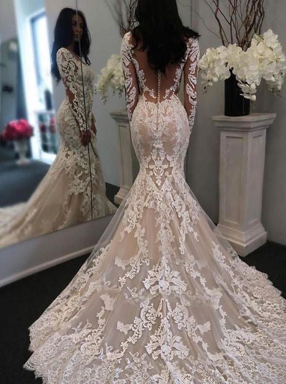 Jolies robes de mariée en dentelle transparente au dos