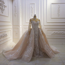 Style #T422 - sheer illusion neckline long sleeve wedding gown with detachable train