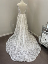 C2022-SV551 - sleeveless v-neck lace wedding gown with detachable over skirt