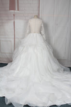 Style 95024 Sheer long sleeve lace bridal gowns with large ball gown skirt
