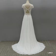 Style #L3913 - Cap sleeve empire waist wedding gown