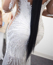 C2022-SLSB448 - Sheer long sleeve plus size wedding gown with Swarovski Crystal Bling