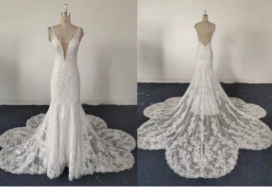 Style QM001 - Sleeveless deep v-neck lace wedding gown