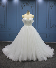 Style #WT4407 Strapless ball gown wedding dress with sheer are cuffs