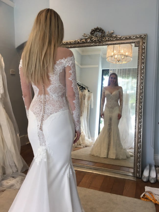 Long sleeve sheer lace wedding gown