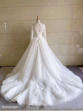 Robe de mariée trapèze transparente à manches longues